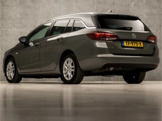 Opel Astra Opel Astra Sports Tourer 1.0 Sportline (APPLE CARPLAY, NAVIGATIE, GETINT GLAS, CHROOM PAKKET, XENON, SPORTSTOELEN, BLUETOOTH, CRUISE CONTROL, NIEUWSTAAT) - afbeelding nr 3