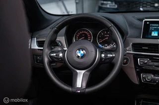 BMW X1 BMW X1 xDrive20i High Executive | 4x4 | HUD | Trekhaak | Leder | Orig NL auto | Dealer onderhouden | Camera | rijklaarprijs | - afbeelding nr 32