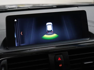 BMW 1 Serie [CRUISE CONTROL, CLIMATE CONTROL, HALF LEDER, BMW LED KOPLAMPEN, PDC ACHTER, BLUETOOTH TELEFOONVERBINDING, NAVIGATIE, NIEUWSTAAT] - afbeelding nr 13