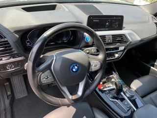 BMW iX3 BMW iX3 High Executive 80 kWh / Trekhaak / Panoramadak / 360Camera / Head-up / 20'' / Leder / Harman Kardon / Navigatie / Memory seats / Dodehoek / DAB / Stoelverwarming / Cruise Control Adaptief - afbeelding nr 4