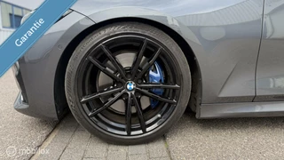 BMW 3 Serie BMW 330i Touring High Executive | M Pakket | Shadowline | H&R | Standkachel | Display Key - afbeelding nr 17