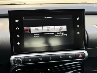 Citroën C4 Cactus Citroen C4 Cactus 1.2 PureTech Shine 110pk Navigatiesysteem | Climate control | Cruise control | Multifunctioneel stuurwiel | Trekhaak | Isofix | Getint glas | Inparkeerhulp | Parkeersensoren voor en achter | Achteruitrijcamera - afbeelding nr 19