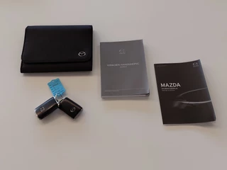 Mazda 3 2.0 e-SkyActiv-X M Hybrid 180pk Comfort | BOSE Sound | Navi | Apple Carplay+Android Auto | Clima | Adap. Cruise | Head-Up | Keyless Entry | Pdc V+A+Camera | Stuur+Stoelverwarming | 18''lm - afbeelding nr 37