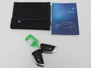 BMW 1 Serie BMW 1-serie 118i Intro Ed. | Carplay | Full LED | Sportstoelen  | Navigatie | Climate control | Bleutooth | PDC | Trekhaak | Sfeerverlichting - afbeelding nr 12