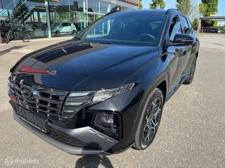 Hyundai Tucson Hyundai Tucson 1.6 T PHEV 265pk  N Line 4WD  65km Electr rijden  hierna Hybride , N-Line Luxe uitvoering ,  360o camera ,  Dodehoek detectie , Electr achterklep  03-2027 Fab Garantie - afbeelding nr 10