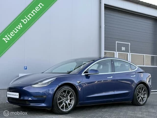 Tesla Model 3 - 455447593-0