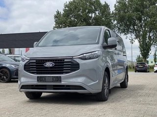 Ford Transit Custom Ford Transit Custom 320 2.5 PHEV L2H1 Limited DC 233pk | Dubbele Cabine | Dubbele zijschuifdeur | 12-weg verstel- en verwarmbare AGR Stoelen | Inklapbare trekhaak | 17 inch lichtmetalen velgen | Driver Assistance Pack Premium  | Verwarmbaar stuurwiel | Bekleding zijwand en achterdeuren (volledig)  | PRIJS EX. BTW INCL. BPM - afbeelding nr 7