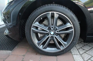 BMW 1 Serie BMW 1-serie 118i 140PK AUTOMAAT EXECUTIVE EDITION | PANORAMISCH SCHUIF/KANTELKDAK | AFNEEMBARE TREKHAAK | DRAADLOZE TELEFOONLADER | DRAADLOZE APPLE CARPLAY/ANDROID AUTO | NAVIGATIE | ACHTERUITRIJ CAMERA | PARKEERSENSOREN VOOR EN ACHTER | CRUISE CONTROL | FULL LED KOPLAMPEN | CLIMATE CONTROL | ALL SEASON BANDEN | 17