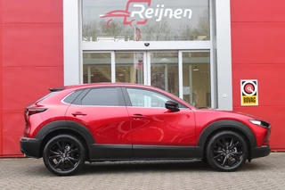 Mazda CX-30 Mazda CX-30 2.0 e-SkyActiv-G M Hybrid 150PK AUTOMAAT NAGISA Mazda CX-30 2.0 e-SkyActiv-G M Hybrid 150PK AUTOMAAT  NAGISA | ELEKTRISCH VERSTELBARE VOORSTOELEN | BESTUURDERSSTOEL MET GEHEUGENFUNCTIE | STOELVERWARMING | BOSE AUDIO SYSTEM | FULL LED KOPLAMPEN | HEAD UP DISPLAY GEKOPPELD AAN STOELGEHEUGEN | CLIMATE CONTROL | DRAADLOOS APPLE CARPLAY/ANDROID AUTO | NAVIGATIE | DODEHOEK DETECTIE | ELEKTRISCHE BEDIENBARE ACHTERKLEP | DRAADLOZE TELEFOON LADER | ADAPTIVE CRUISE CONTROL | KEYLESS ENTRY/START | SPORT PAKKET | - afbeelding nr 13