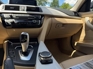 BMW 3 Serie BMW 3-serie 320i High Executive 184 PK / PDC / NAVIGATIE / CRUISE / NL AUTO / LEDER / AUTOMAAT - afbeelding nr 13