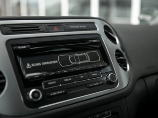 Volkswagen Tiguan Volkswagen Tiguan 1.4TSi DSG6 Cup Sport&Style | Trekhaak 1.800kg. | 2e eigenaar | Climate Control | Stoelverwarming | Parkeer pakket | Winter-pakket | Koplampsproeiers | Multifunctioneel lederen stuurwiel - afbeelding nr 16