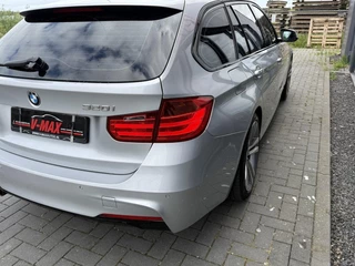 BMW 3 Serie BMW 320i Touring AUT M-Sport Stoelvw Pano NaviProf Trekhaak - afbeelding nr 35