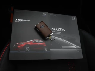 Mazda 2 Mazda 2 1.5 e-SkyActiv-G Homura Aka met Driver Assistance pakket en dakspoiler : dealer onderhouden - afbeelding nr 38