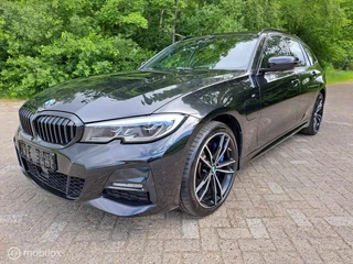 BMW 3 Serie BMW 3-serie Touring 330e M-Sport|Pano|Laser|Head-Up - afbeelding nr 6