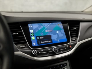 Opel Astra Opel Astra Sports Tourer 1.0 Sportline (APPLE CARPLAY, NAVIGATIE, GETINT GLAS, CHROOM PAKKET, XENON, SPORTSTOELEN, BLUETOOTH, CRUISE CONTROL, NIEUWSTAAT) - afbeelding nr 21