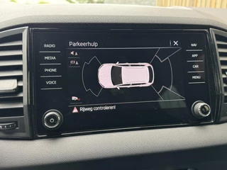 Škoda Karoq Skoda Karoq 1.5 TSI Sportline Automaat | Panoramadak | LED | Stoelverwarming | Adaptieve cruise control | Dode hoek detectie | Trekhaak uitklapbaar | Canton HiFi | Elektrisch bedienbare achterklep | Parkeersensoren voor en achter | Achteruitrijcamera - afbeelding nr 36