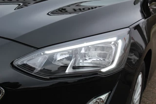 Ford Focus Ford Focus Wagon 1.0-125pk EcoBoost Mild-hybrid Titanium. Mooie, ruime, luxe en comfortabele Ford Focus wagon ! Volautm. airco dual, camera, stoel-, stuur- en voorraamverw., easy entry/easy go, cruise control, Isofix, side- en lane assist, parkeersensoren v+a, LM wielen etc. - afbeelding nr 3