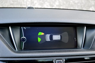 BMW X1 Rijklaarprijs-Garantie Panorama dak Leder Xenon Navigatie - afbeelding nr 23