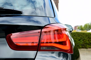 BMW 1 Serie BMW 1 Serie 118i Sport-Line Rijklaarprijs-Garantie Navigatie Led Sport Interieur Airco - afbeelding nr 8