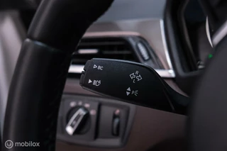 BMW X1 BMW X1 xDrive20i High Executive | 4x4 | HUD | Trekhaak | Leder | Orig NL auto | Dealer onderhouden | Camera | rijklaarprijs | - afbeelding nr 18