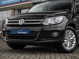 Volkswagen Tiguan Volkswagen Tiguan 1.4TSi DSG6 Cup Sport&Style | Trekhaak 1.800kg. | 2e eigenaar | Climate Control | Stoelverwarming | Parkeer pakket | Winter-pakket | Koplampsproeiers | Multifunctioneel lederen stuurwiel - afbeelding nr 24