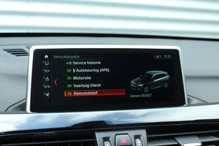 BMW X1 BMW X1 sDrive18i 141pk AUTOMAAT NL-Auto 74.942km Clima Cruise Navi Camera HUD Keyless El. Klep 17