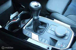 BMW 1 Serie BMW 1-serie 118i M Sport High Executive, Sportstoelen, Carplay, Pdc voor + achter, Stoelverwarming, Cruise, Clima. - afbeelding nr 19