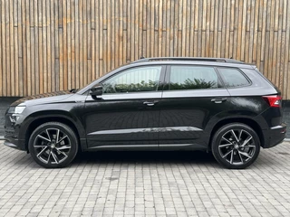 Škoda Karoq Skoda Karoq 1.5 TSI Sportline Automaat | Panoramadak | LED | Stoelverwarming | Adaptieve cruise control | Dode hoek detectie | Trekhaak uitklapbaar | Canton HiFi | Elektrisch bedienbare achterklep | Parkeersensoren voor en achter | Achteruitrijcamera - afbeelding nr 72