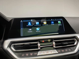BMW 3 Serie BMW 3-serie Touring 320e M Sport (PANORAMADAK,APPLE CARPLAY,NAVI,SFEERVERLICHTING,STOELVERWARMING,CAMERA,LEDER,CRUISE,CLIMATE) - afbeelding nr 31