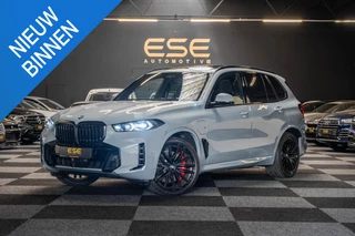 BMW X5 BMW X5 xDrive50e Hybrid M-Sport | Pano Skylounge | HUD | 360 | Brooklyn Grau - afbeelding nr 1