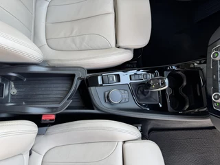 BMW X1 BMW X1 xDrive20i Executive Cruise control Climate control Trekhaak Dealeronderhouden Audio - afbeelding nr 40