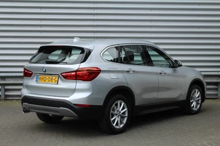 BMW X1 BMW X1 sDrive18i 141pk AUTOMAAT NL-Auto 74.942km Clima Cruise Navi Camera HUD Keyless El. Klep 17