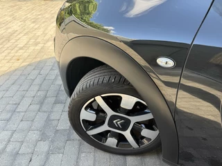 Citroën C4 Cactus Citroen C4 Cactus 1.2 PureTech Shine 110pk Navigatiesysteem | Climate control | Cruise control | Multifunctioneel stuurwiel | Trekhaak | Isofix | Getint glas | Inparkeerhulp | Parkeersensoren voor en achter | Achteruitrijcamera - afbeelding nr 55