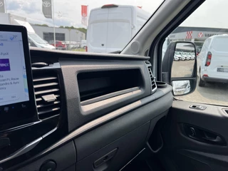 Ford E-Transit Ford E-Transit 350 L2H2 Trend 68 kWh 184pk | ZUID | Pro Power on board | Navigatie | Adaptieve Cruise |  Digitale binnenspiegel | Laadruimtebescherming | Reservewiel | H7 batterij | LED laadruimteverlichting - afbeelding nr 24