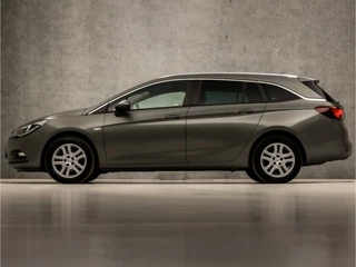 Opel Astra Opel Astra Sports Tourer 1.0 Sportline (APPLE CARPLAY, NAVIGATIE, GETINT GLAS, CHROOM PAKKET, XENON, SPORTSTOELEN, BLUETOOTH, CRUISE CONTROL, NIEUWSTAAT) - afbeelding nr 2