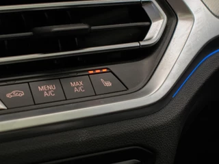 BMW 3 Serie BMW 3-serie Touring 320e M Sport (PANORAMADAK,APPLE CARPLAY,NAVI,SFEERVERLICHTING,STOELVERWARMING,CAMERA,LEDER,CRUISE,CLIMATE) - afbeelding nr 22