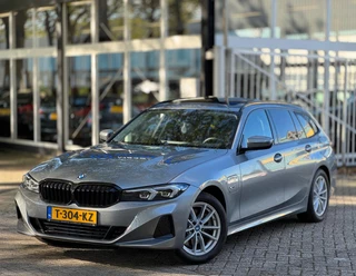 BMW 3 Serie BMW 3-serie Touring 320e Nieuwstaat AUT Pano Plug in hybrid Wide screen Elek.Trekhaak Stoelverwarming Adaptive LED - afbeelding nr 2