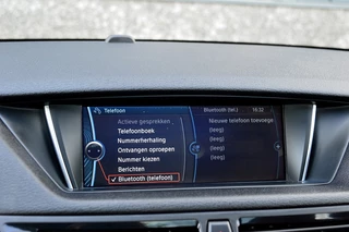 BMW X1 Rijklaarprijs-Garantie Panorama dak Leder Xenon Navigatie - afbeelding nr 22