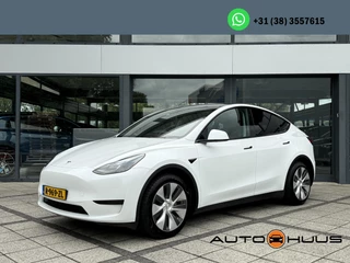 Tesla Model Y - 104103687-0