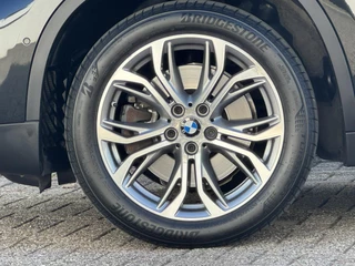 BMW X1 BMW X1 xDrive20i Executive Cruise control Climate control Trekhaak Dealeronderhouden Audio - afbeelding nr 18