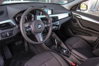 BMW X1 ➡️ BMW X1 sDrive18i F48 Executive | 2e eigenaar | Trekhaak | Sportstuur | DAB | Navi | PDC | Cruise-control | Climate | 140 pk | Automaat | 17 inch | Bluetooth | - afbeelding nr 13