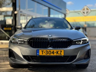 BMW 3 Serie BMW 3-serie Touring 320e Nieuwstaat AUT Pano Plug in hybrid Wide screen Elek.Trekhaak Stoelverwarming Adaptive LED - afbeelding nr 3