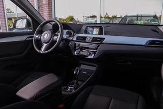 BMW X1 ➡️ BMW X1 sDrive18i F48 Executive | 2e eigenaar | Trekhaak | Sportstuur | DAB | Navi | PDC | Cruise-control | Climate | 140 pk | Automaat | 17 inch | Bluetooth | - afbeelding nr 12