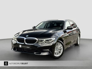 BMW 3 Serie Touring 330e xDrive | Laser | Trekhaak | Head Up | 360 | Sfeerverlichting | Dodehoek | 1e eigenaar