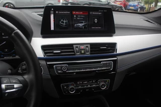 BMW X1 BMW X1 xDrive25e Executive Ed. M Sport / Trekhaak / Panoramadak / Camera / Head-up / Leder / 19'' / Navigatie / Stoelverwarming / DAB / Cruise Control - afbeelding nr 18