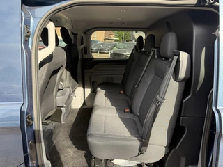 Ford Transit Custom Ford Transit Custom 300 2.0 TDCI L2H1 Limited DC | SCI | 136pk | Dubbele Cabine | Chrome Blue | Trekhaak | Dubbele Schuifdeur | Bijrijdersstoel | Sidesteps | Bumperpakket | Zwarte velgen  | Stoelverwarming | Camera - afbeelding nr 26