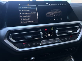 BMW 3 Serie BMW 3 Serie Touring 320e xDrive M-Sport - afbeelding nr 28