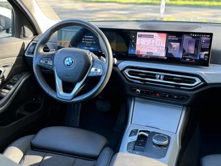 BMW 3 Serie BMW 3-serie Touring 320e Nieuwstaat AUT Pano Plug in hybrid Wide screen Elek.Trekhaak Stoelverwarming Adaptive LED - afbeelding nr 14