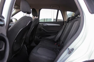 BMW X1 ➡️ BMW X1 sDrive18i F48 Executive | 2e eigenaar | Trekhaak | Sportstuur | DAB | Navi | PDC | Cruise-control | Climate | 140 pk | Automaat | 17 inch | Bluetooth | - afbeelding nr 18