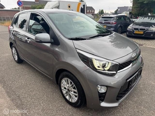 Kia Picanto Kia Picanto 1.0 67pk Automaat  Stoel en Stuur verwarming ,  Navigatie / Apple carplay  / Android auto , Achteruit camera , Bluetooth , Priveglas , Chrome handgrepen , Sport Velgen ,  9.500km !! - afbeelding nr 7